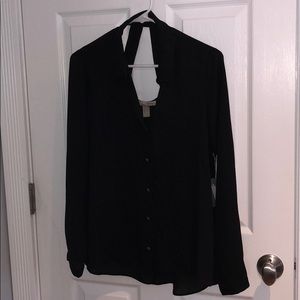 Contemporary black long sleeve with cutout on back